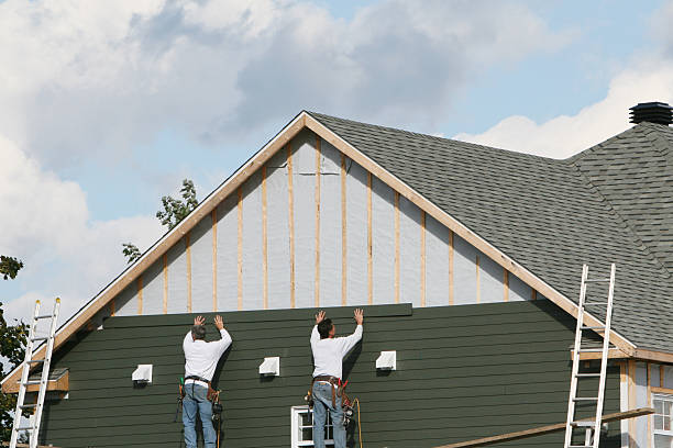 Professional Siding Repair technician working in Hudson, IL